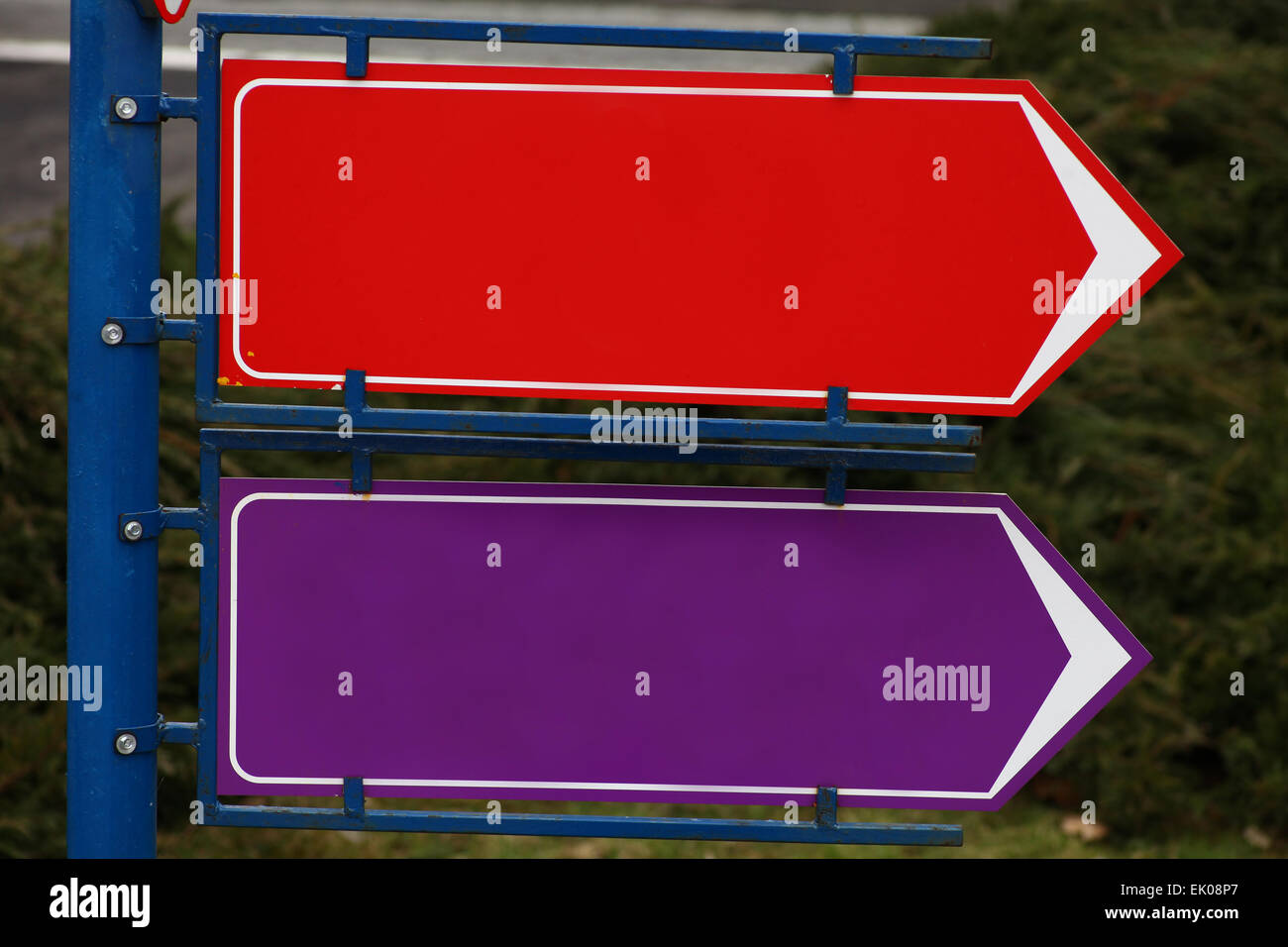 Picture of two colored and empty directional signs. Stock Photo