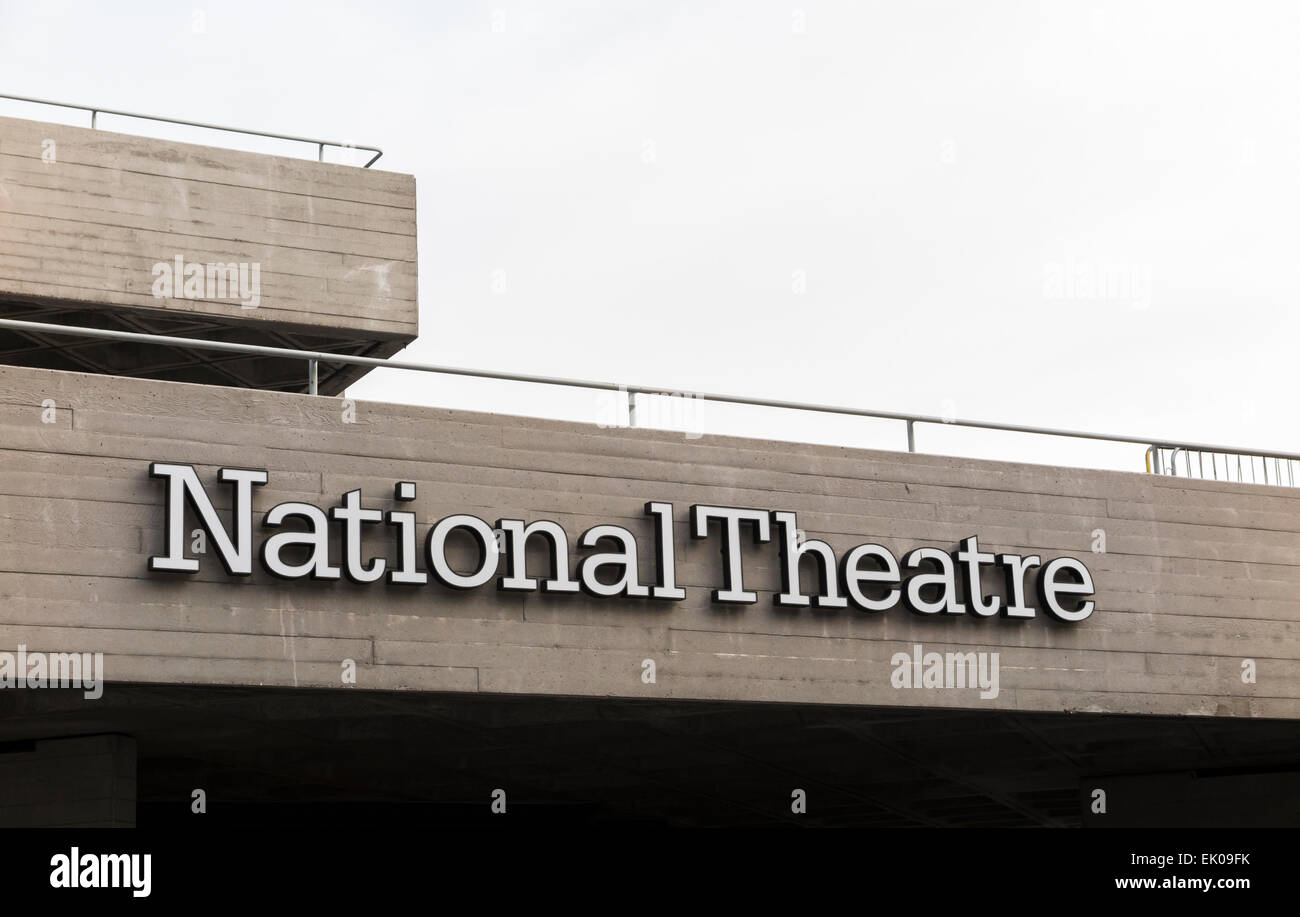 National Theatre name sign at high level viewed from the Embankment Riverside walkway, South Bank, Lambeth / Southwark, London, SE1, UK Stock Photo