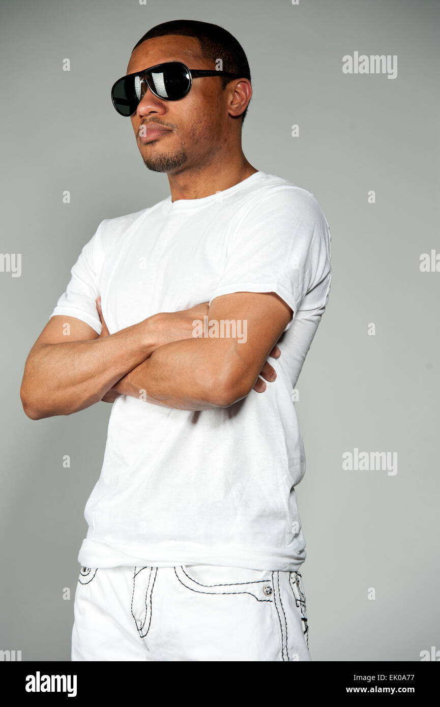 Happy black man white shirt hi-res stock photography and images - Alamy