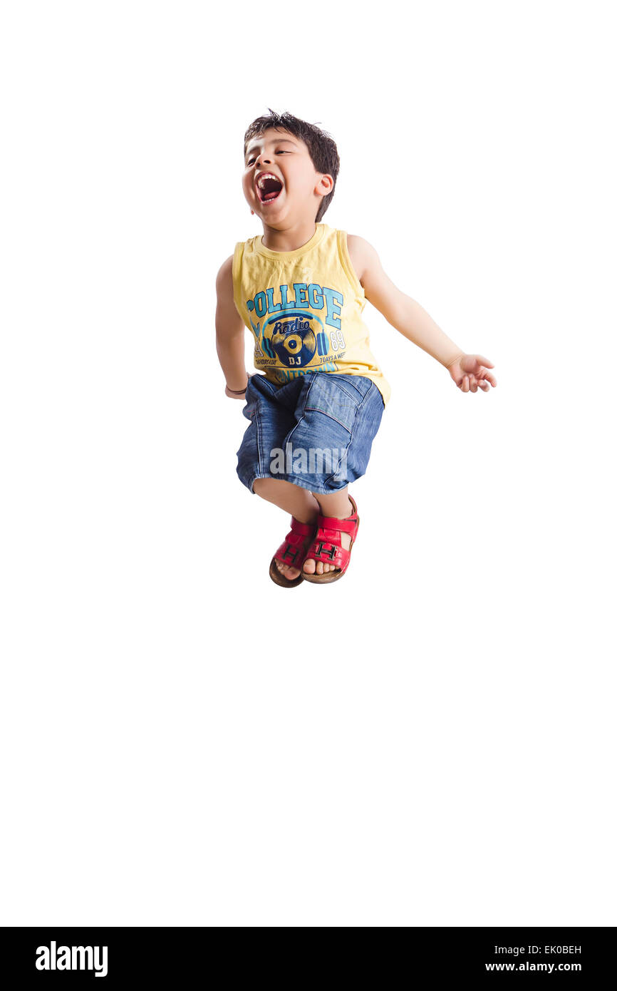 1 indian kids boy Jumping fun Stock Photo