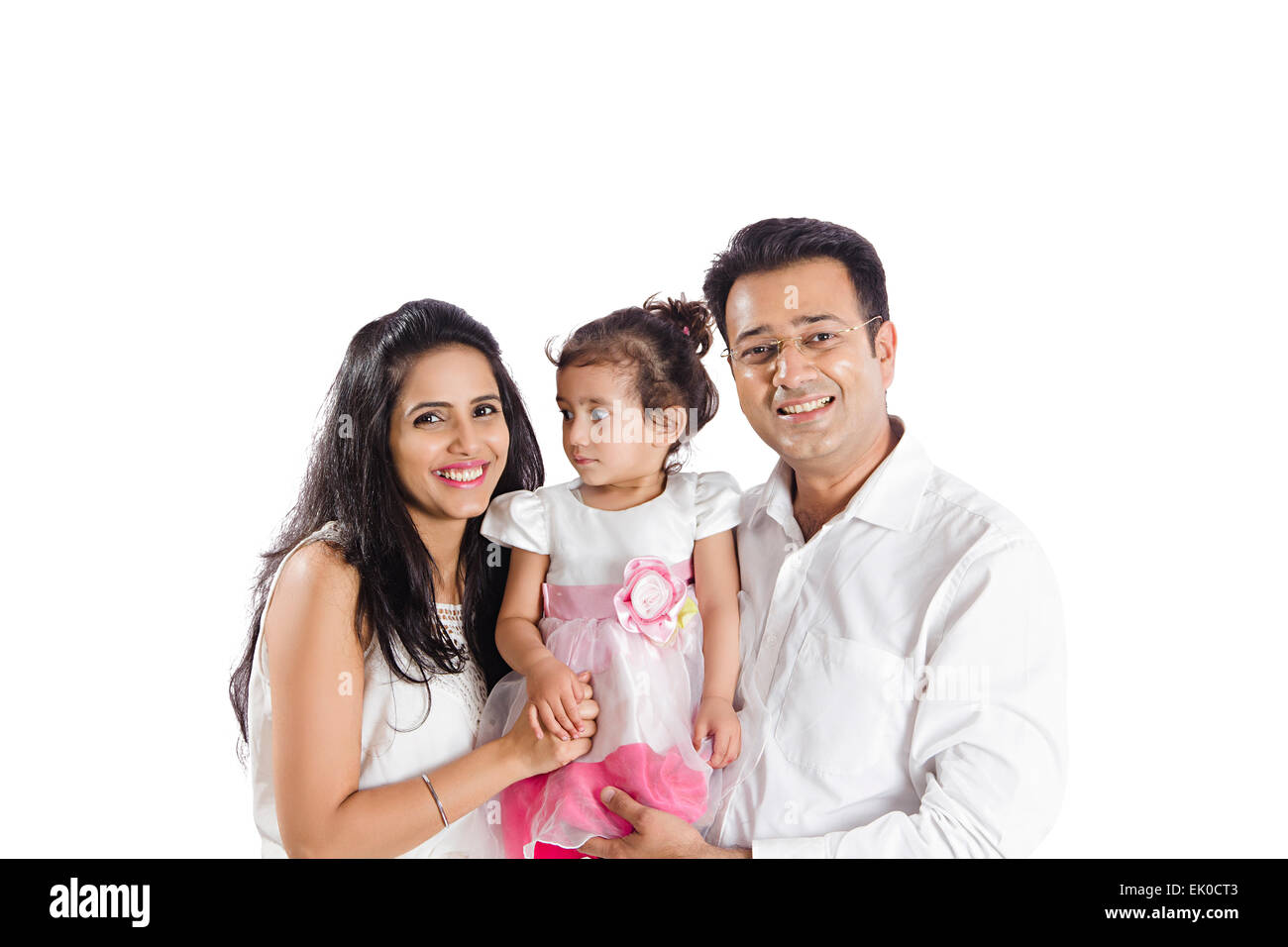 indian Parents and daughter sitting home Stock Photo