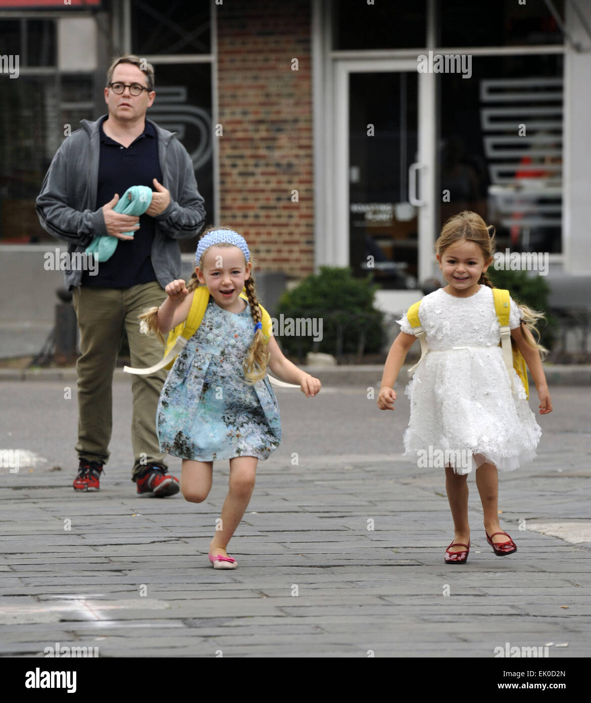 Matthew Broderick takes his twin daughters Marion and Tabitha to school Featuring: Matthew Broderick,Marion Loretta Elwell Broderick,Tabitha Hodge Broderick Where: New York City, New York, United States When: 29 Sep 2014 Stock Photo