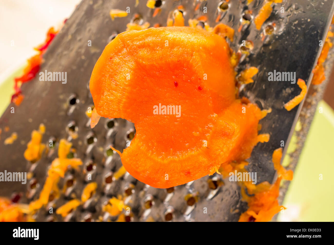 rub carrots and grater Stock Photo - Alamy