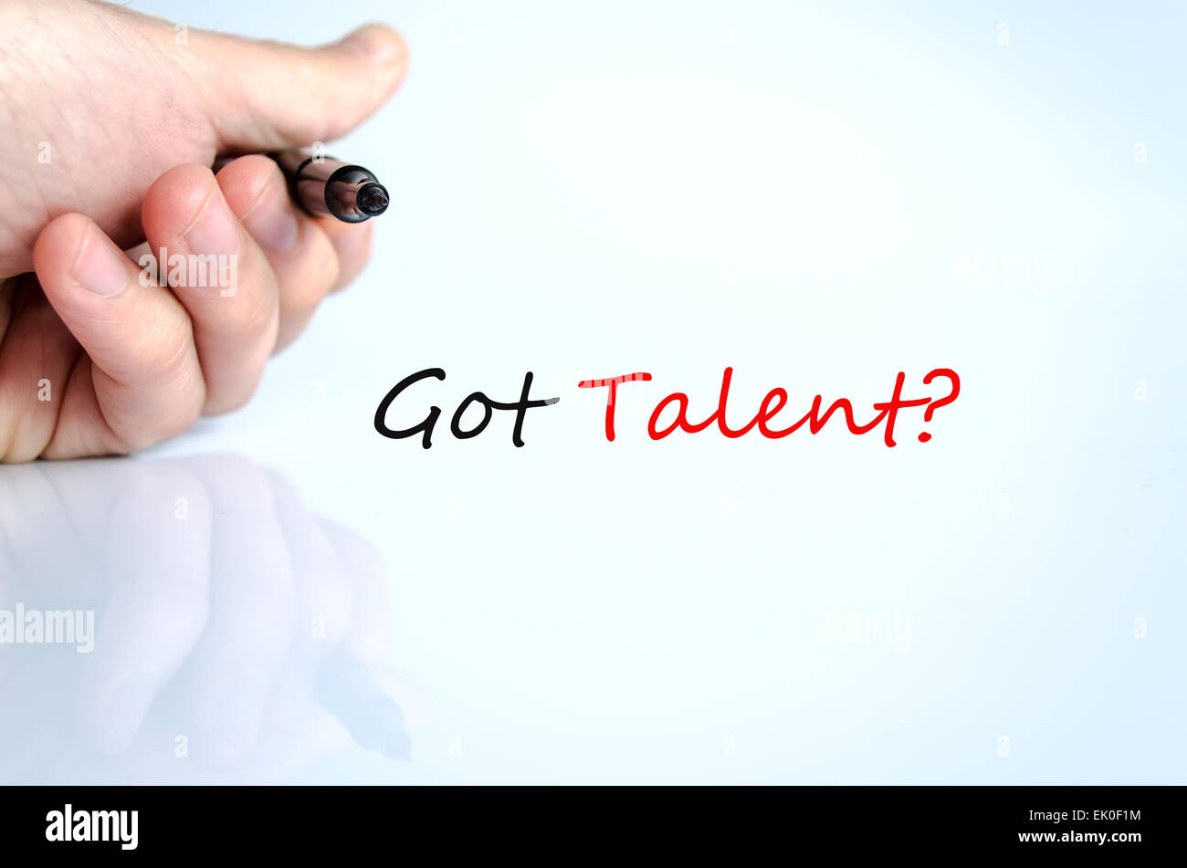 Pen in the hand isolated over white background and text concept got talent? Stock Photo