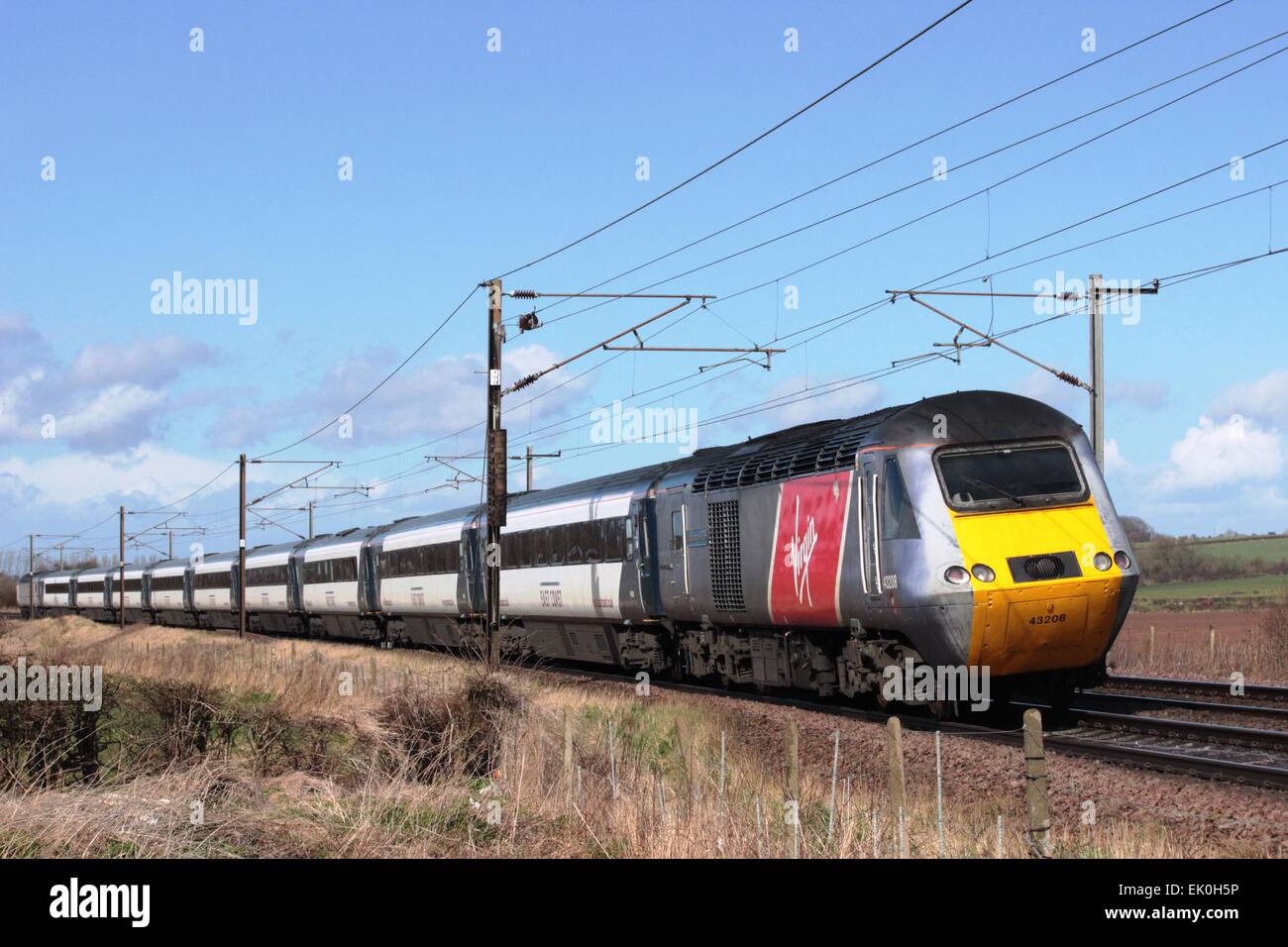 New Virgin branding on HST power car on East Coast Main Line soon after the change of franchise to Virgin Trains East Coast. Stock Photo