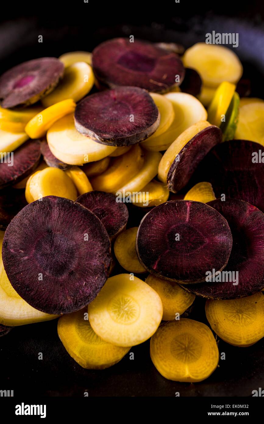 nobody, no one, no-one, healthy eating, fresh, food, food and drink, still life, studio shot, studio shots, large group of objects, carrots, chanteney carrots, slices, sliced, variety, variation, varied, heritage carrots, root vegetables, heirloom carrots Stock Photo