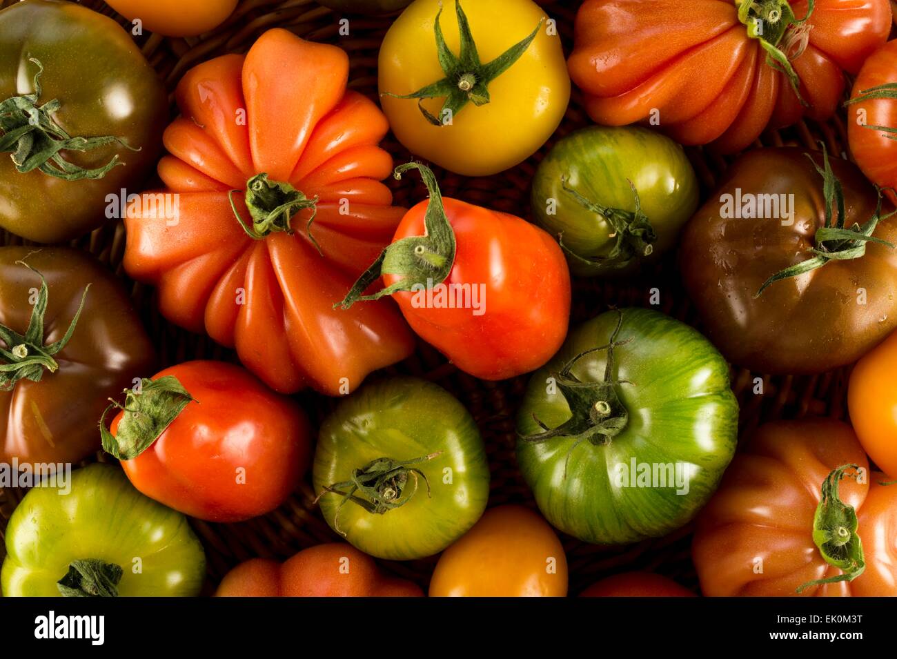 nobody, no one, no-one, healthy eating, fresh, food, food and drink, produce, fruit, still life, large group of objects, tomatoes, heritage tomatoes, tomato, heritage tomato, variety, variation, varied, full frame, heirloom tomatoes Stock Photo