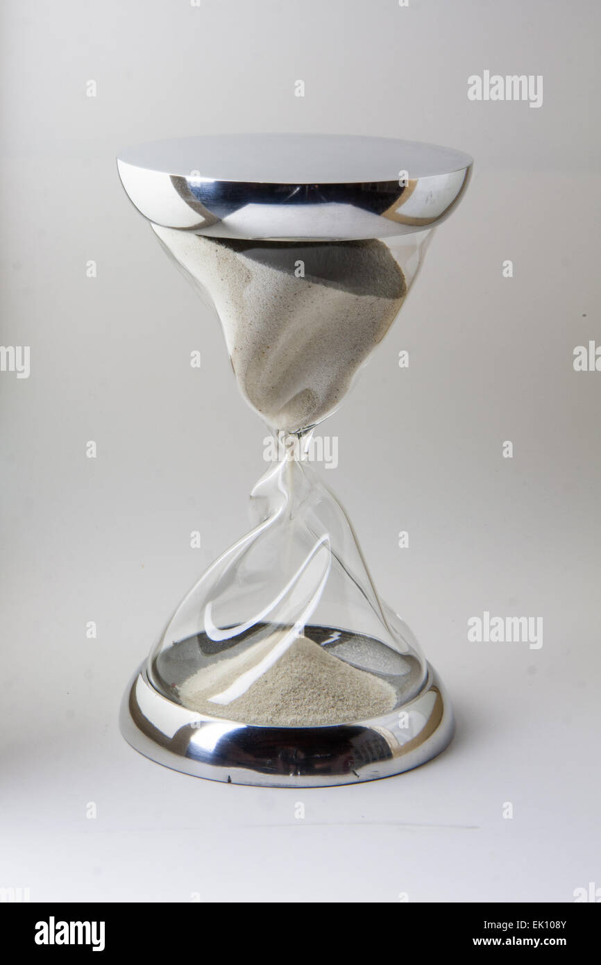 hourglass closeup with twisted glass and steel closure Stock Photo