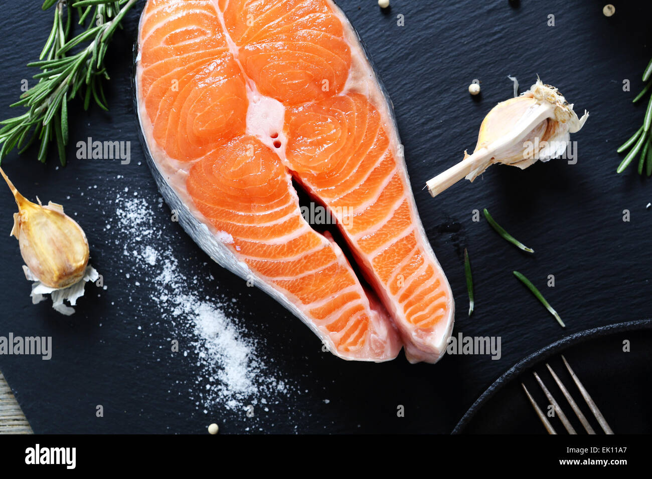 Raw Salmon on a slate background, food Stock Photo - Alamy