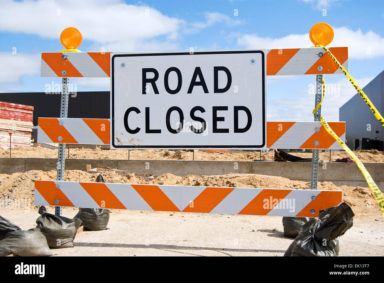 Road Closed sign with caution tape Stock Photo Alamy