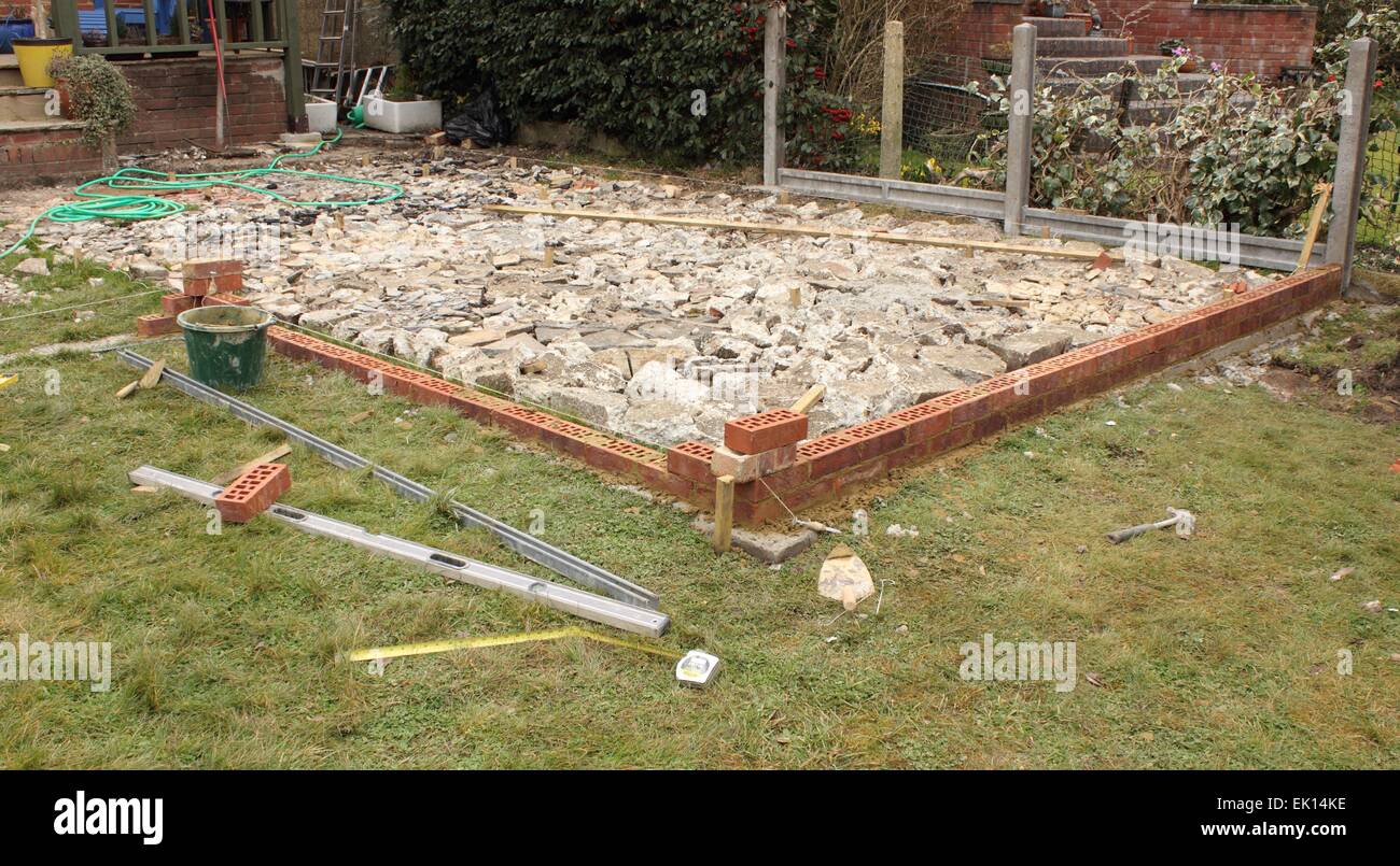 The construction and Building of a natural stone patio Stock Photo Alamy