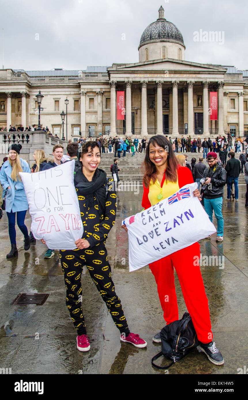 A pillow fight in Trafalgar Square. Girls fans of Zayn Malik Stock