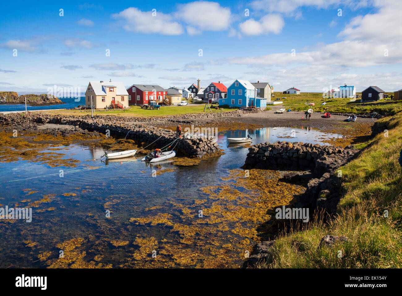 Small boats in an inlet on Flatey Island in Breidafjordur Iceland. Stock Photo