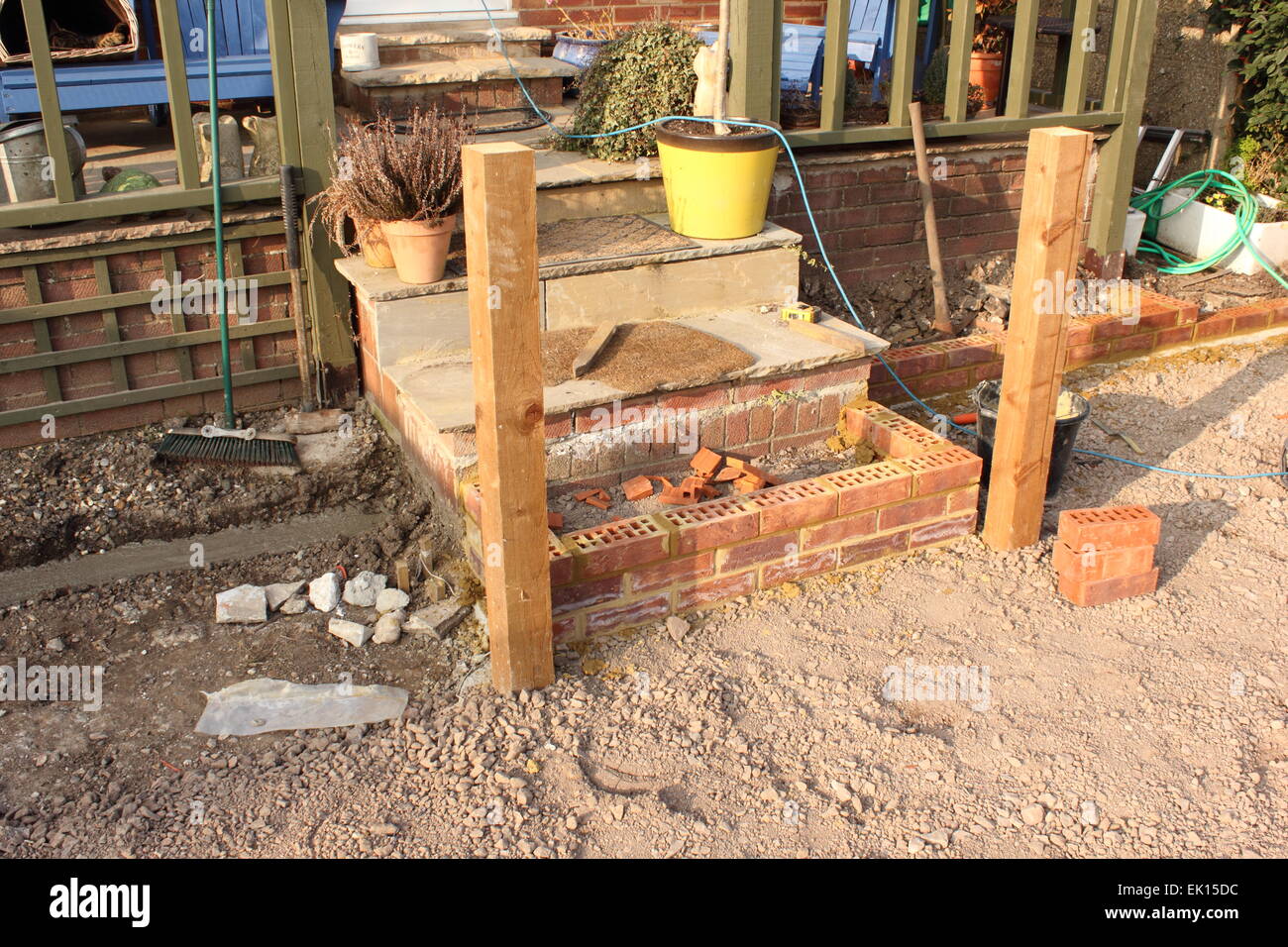 The construction and Building of a natural stone patio Stock Photo Alamy