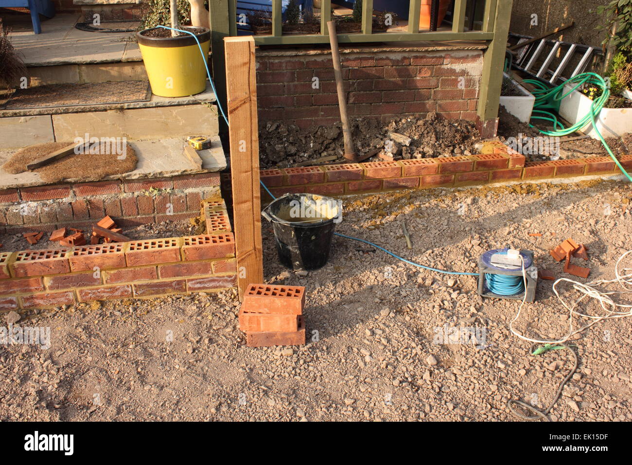 The construction and Building of a natural stone patio Stock Photo Alamy