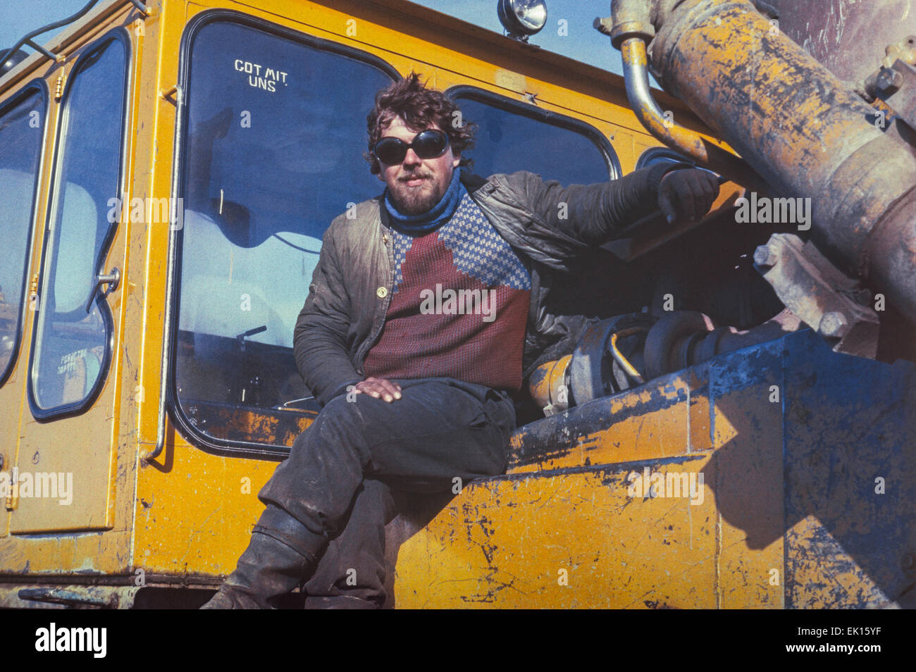Chukchi Peninsula, USSR - 15 April, 1983: Young soviet tractor driver having  short rest in gold mining work beyond Polar circle Stock Photo