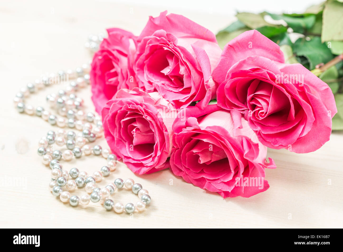 Bouquet of pink roses on white background Stock Photo - Alamy