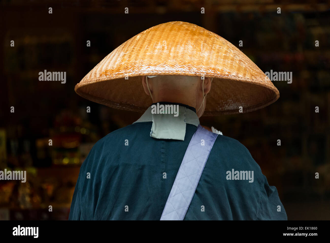 Monk on the street, Miyajima, Japan Stock Photo