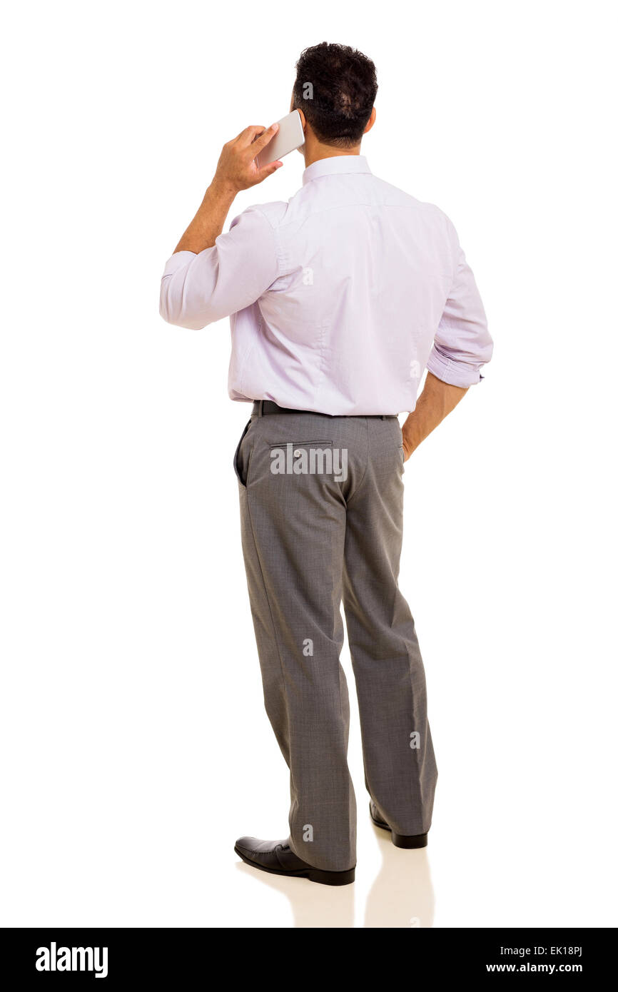 rear view of man talking on cell phone isolated on white background ...
