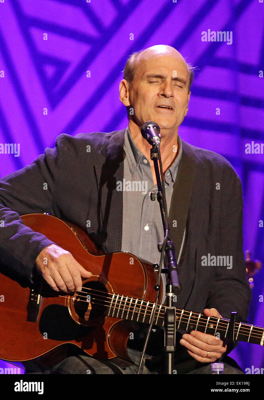 James Taylor performing live on stage at Manchester Phones4U Arena