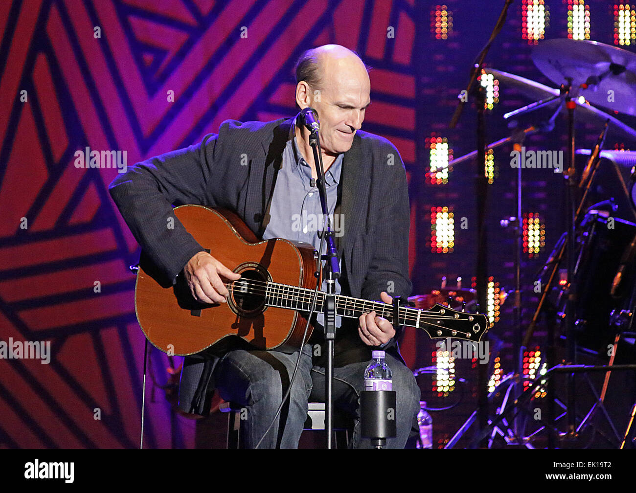 James Taylor performing live on stage at Manchester Phones4U Arena