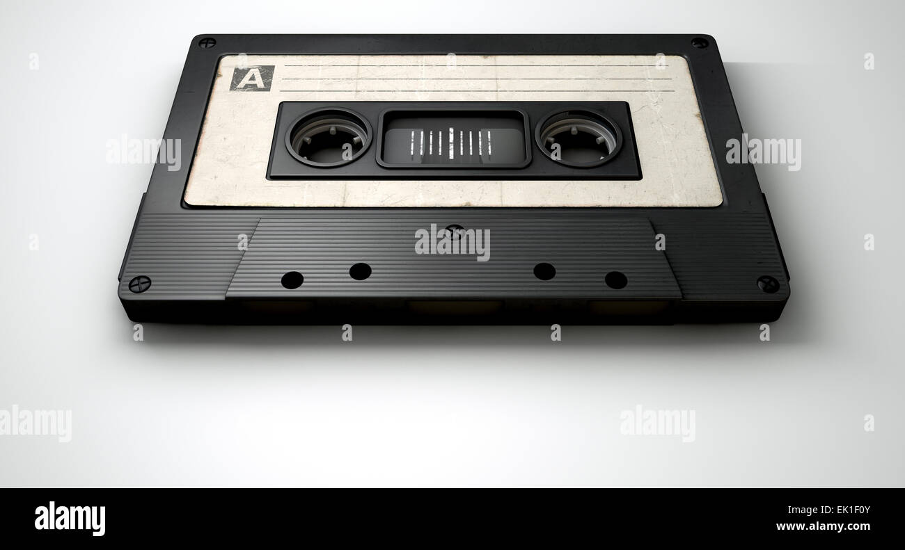 A close up view of a black vintage audio cassette tape with a white ...