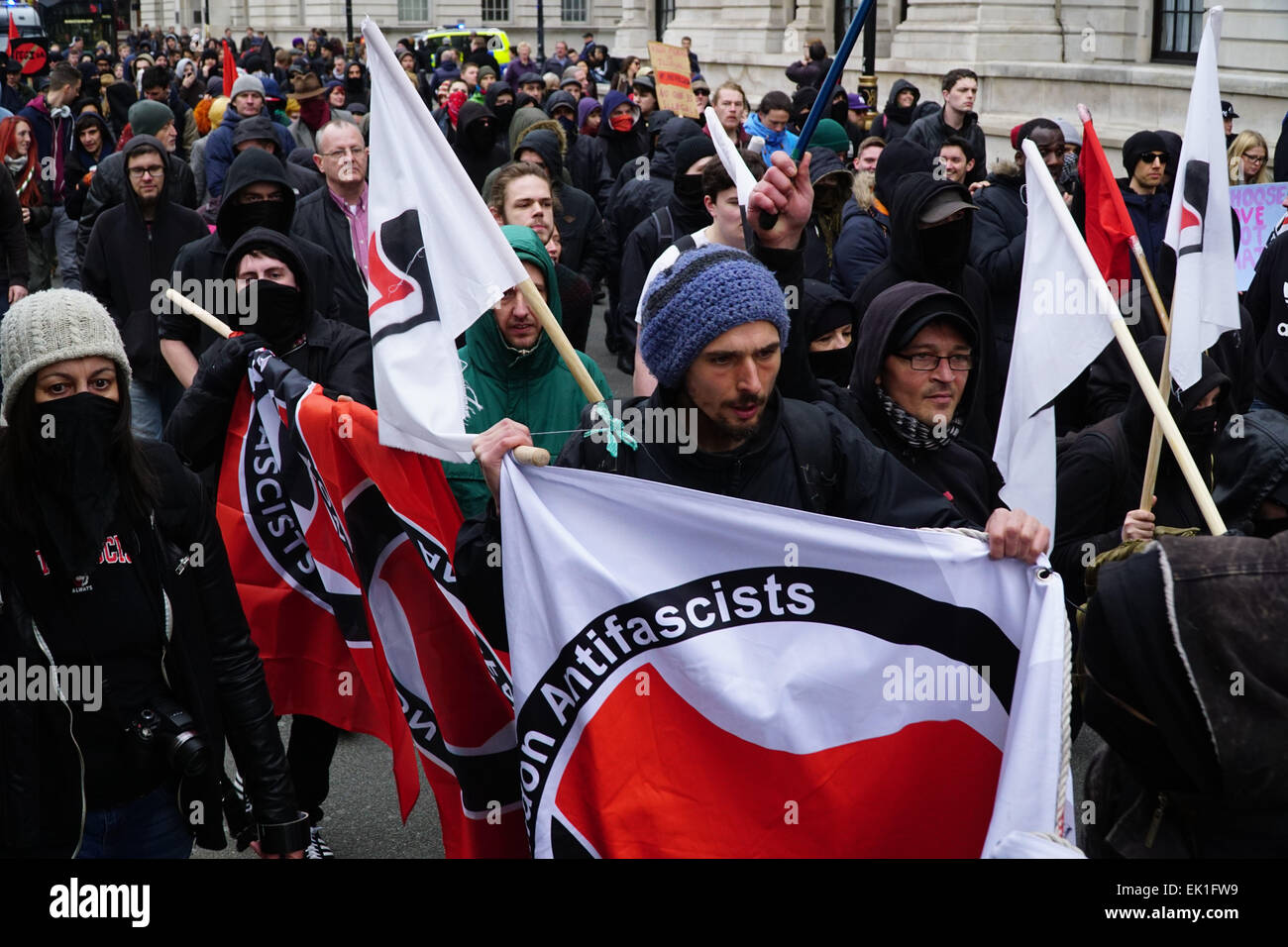 London, UK, 4th April, 2015. Anti-Fascist Bloc assembly at Trafalgar square then march to Whitehall counter attack with The English version of Pegida, the anti-Islam movement that originated in Germany, but were opposed by a larger anti-racist protest staged by the Unite Against Fascism (UAF) group.. . Photo by See Li Stock Photo