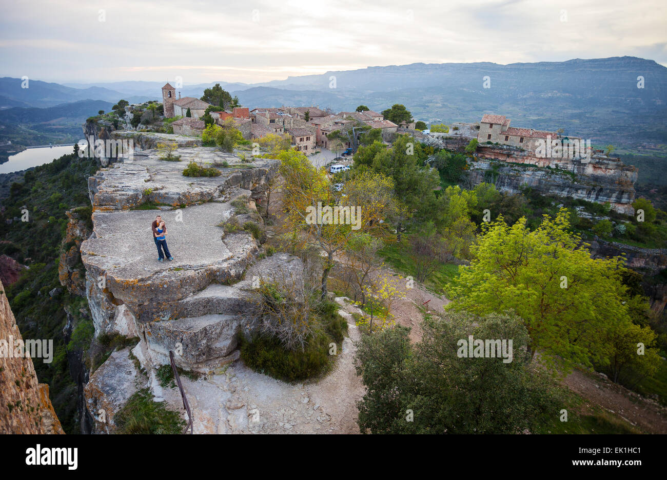 Couple standing on top hill hi-res stock photography and images - Alamy