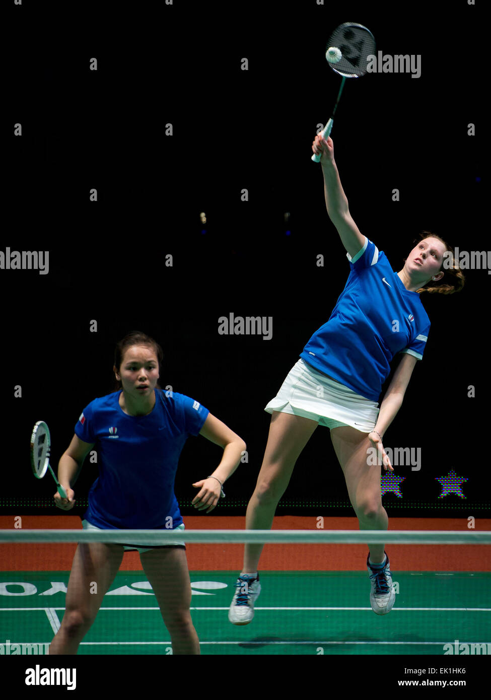 Lubin, Poland. 4th April, 2015. Final of individual tournament in badminton during European Junior Championships 2015. Women's doubles match between Danmark (red): Julie Dawall Jakobsen and Ditte Soby Hansen - France (blue): Verlaine Faulmann (R) and Anne Tran (L) Credit:  Piotr Dziurman/Alamy Live News Stock Photo