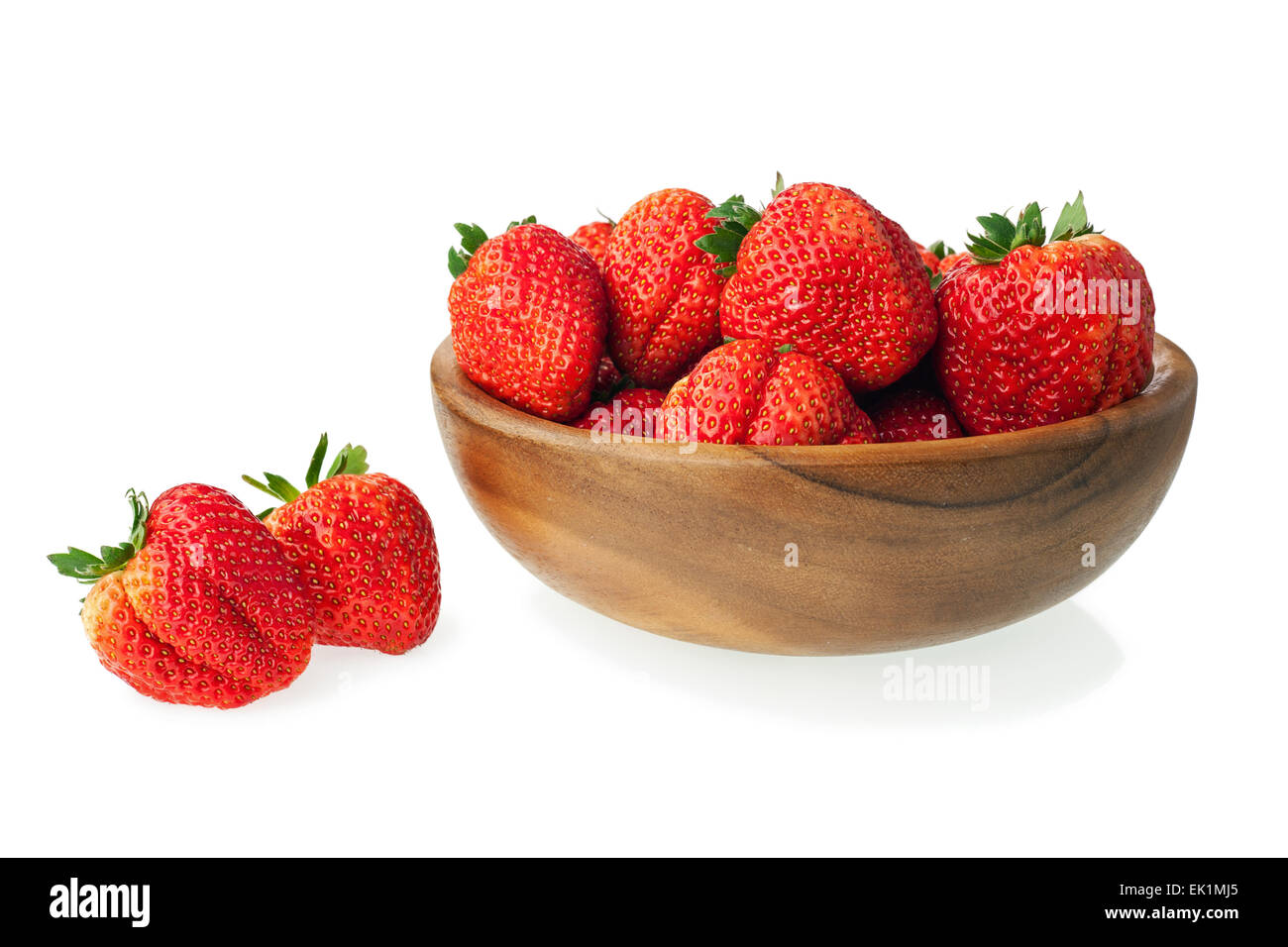Fresh ripe strawberries in wooden bowl isolated on white background ...