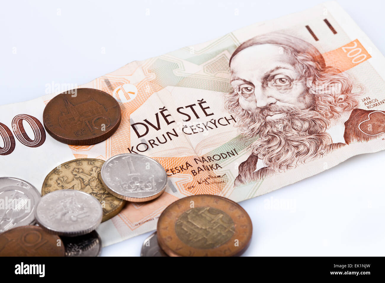 czech koruna, former czech republic banknotes and hard money on white background, Stock Photo