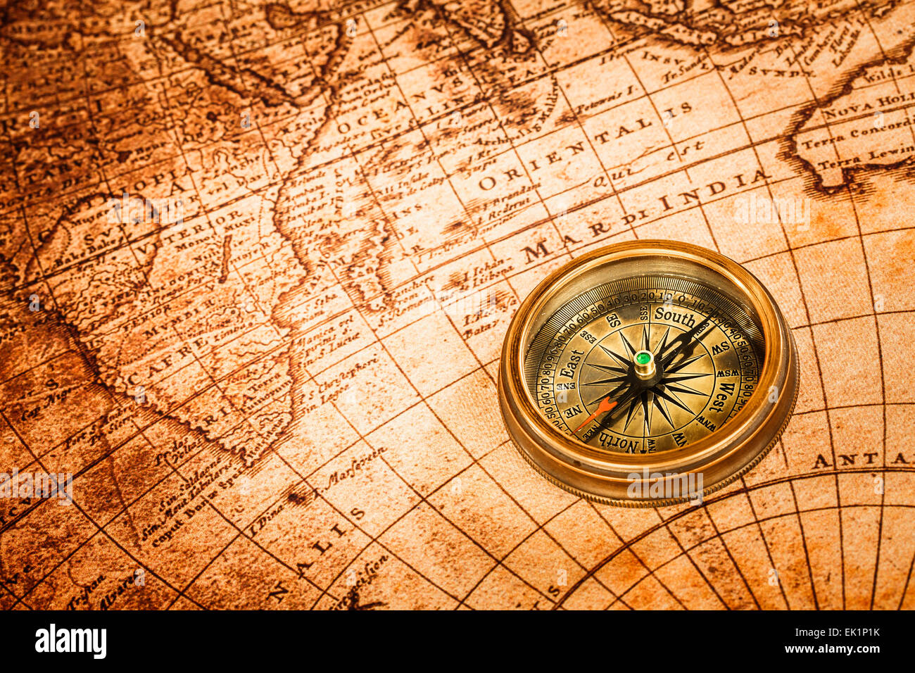 Compass and Chess on old map Stock Photo by ©kwanchaidp