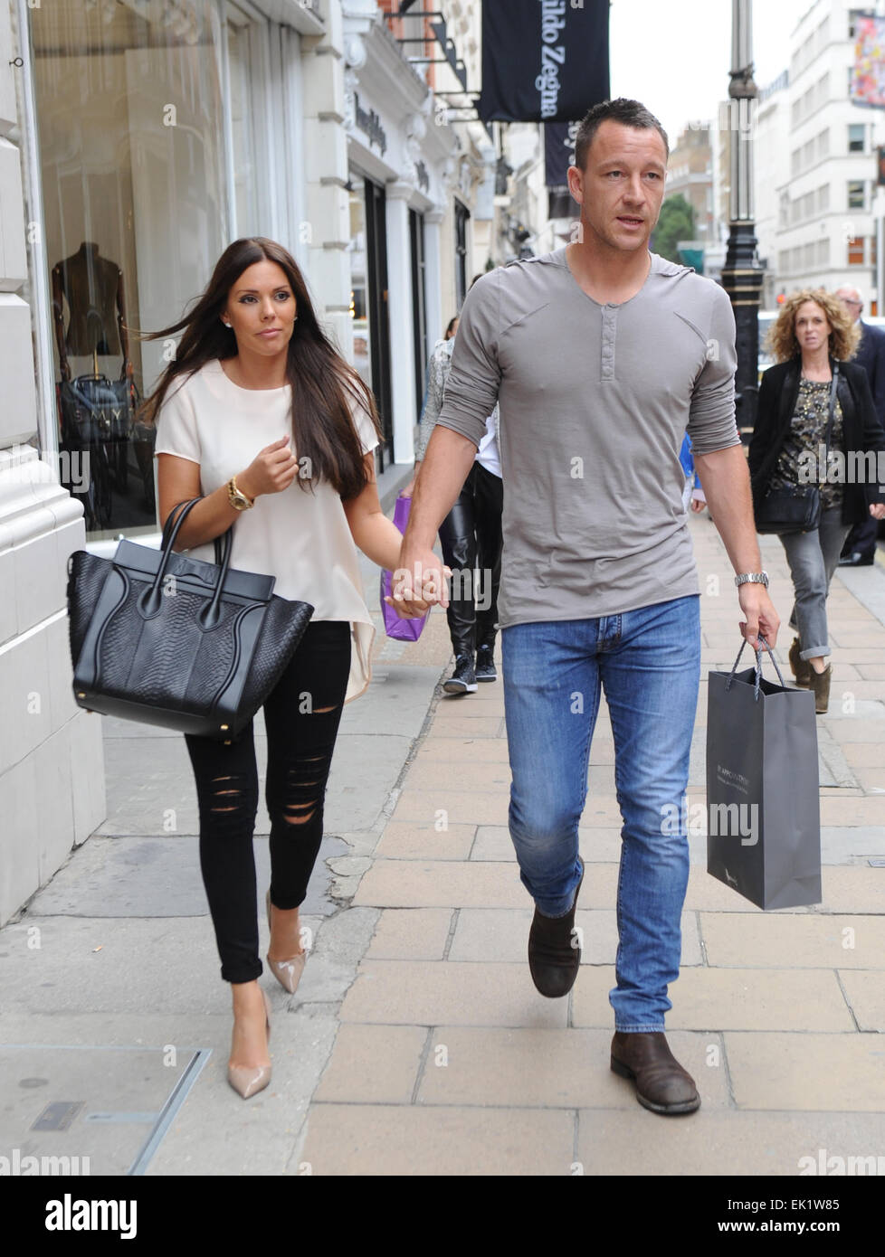 Chelsea football player John Terry and wife Toni out shopping in London  Featuring: John Terry,Toni Terry Where: London, United Kingdom When: 01 Oct  2014 Stock Photo - Alamy