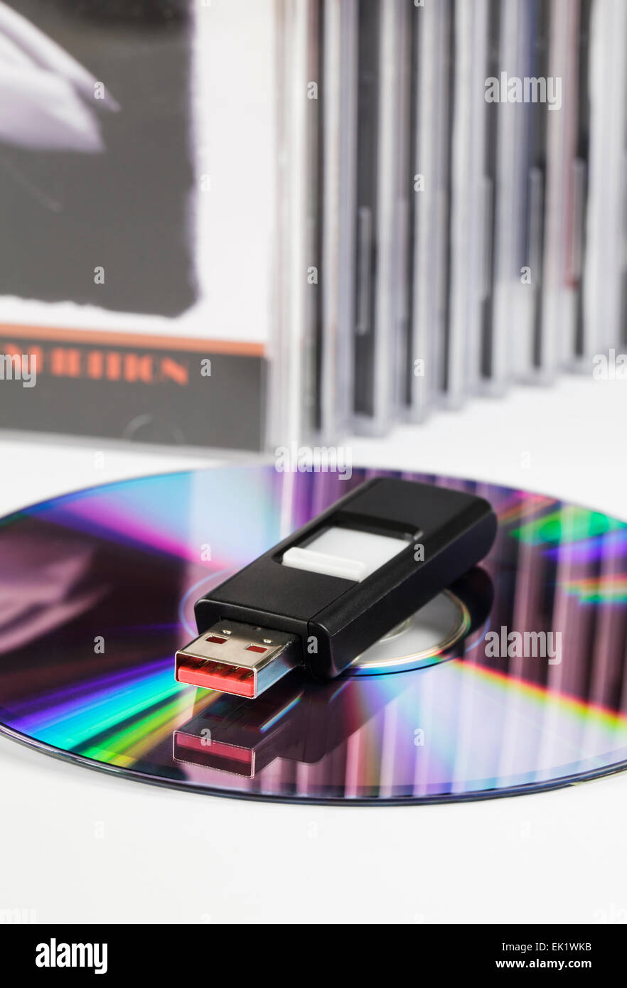 One USB Flash drive and a stack of DVD's Stock Photo