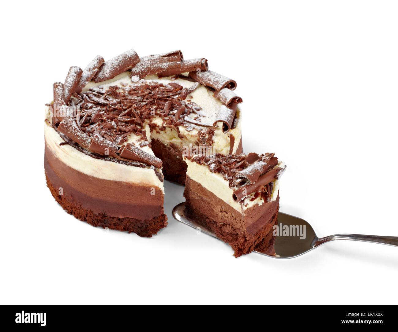 close up of a chocolate cream cake on white plate Stock Photo - Alamy