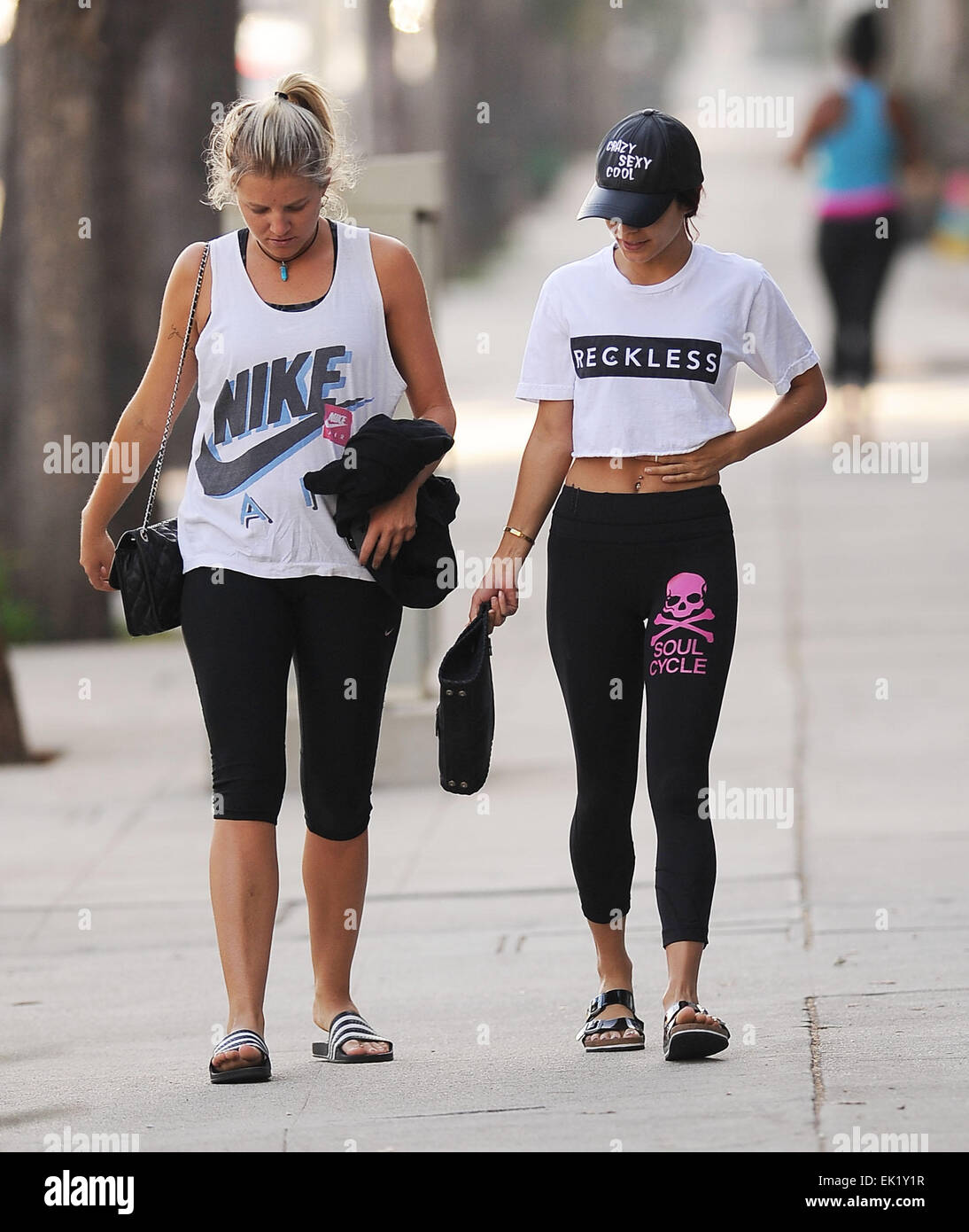A camera shy Vanessa Hudgens is spotted leaving a pilates class with a