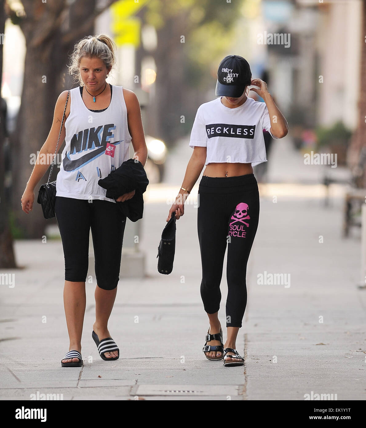A camera shy Vanessa Hudgens is spotted leaving a pilates class with a
