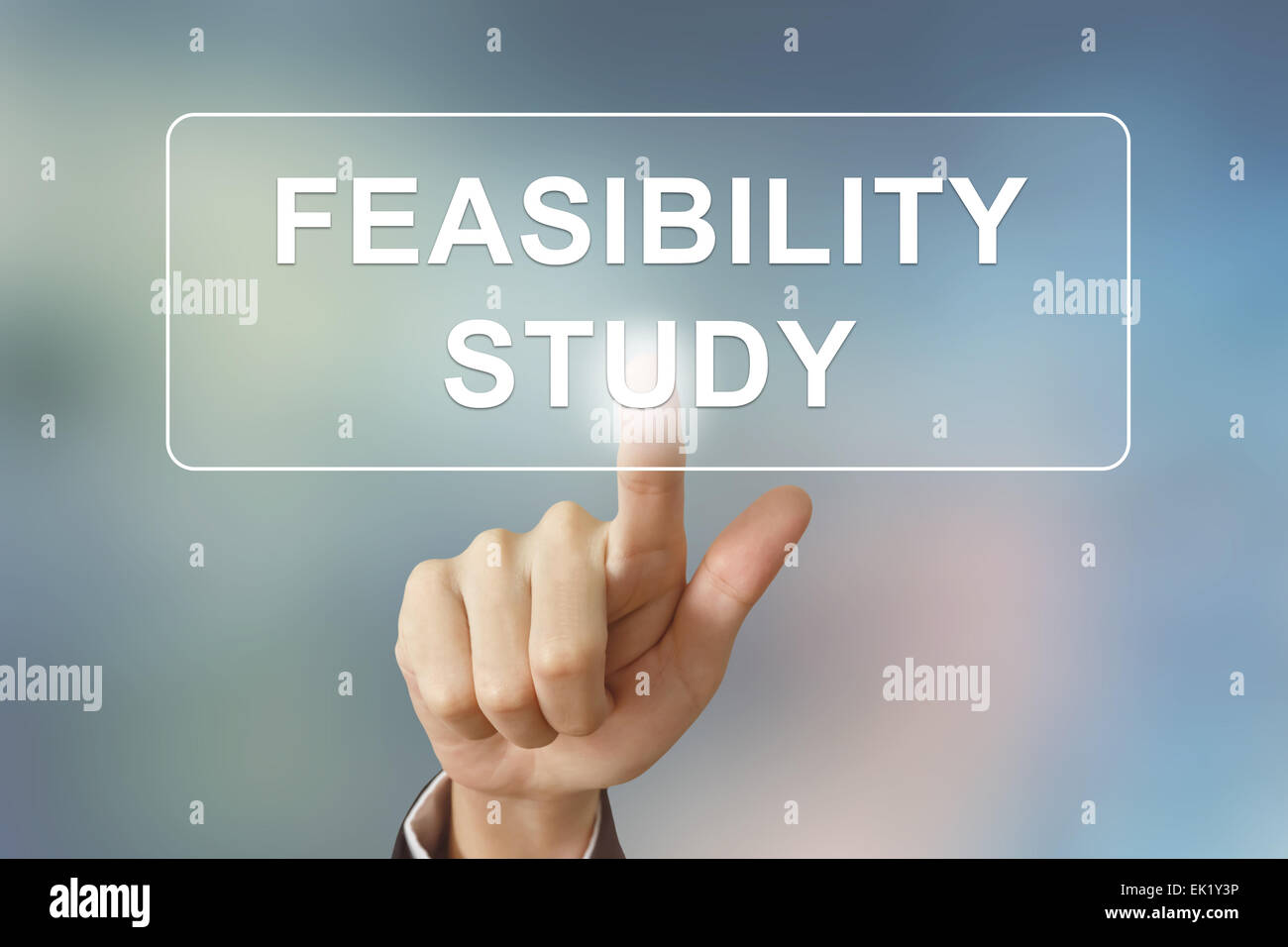 business hand pushing feasibility study button on blurred background Stock Photo