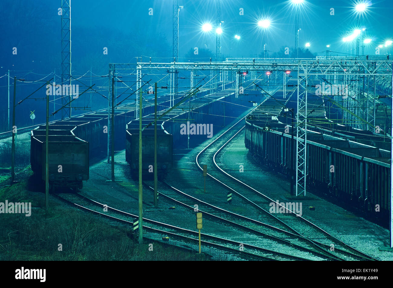 Train boxcars late at night at freight junction in Zagreb, Croatia Stock Photo