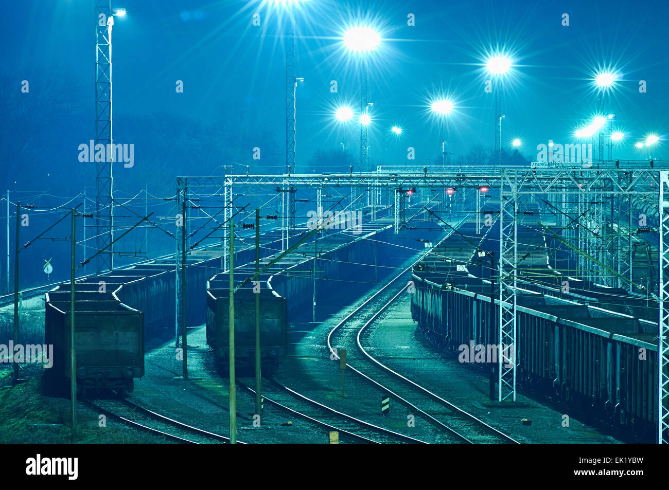 Train boxcars late at night at freight junction in Zagreb, Croatia Stock Photo