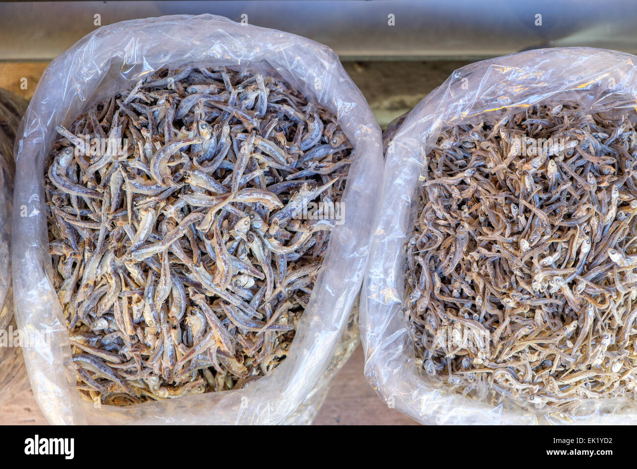 dried tiny fish in plastic bag Stock Photo - Alamy