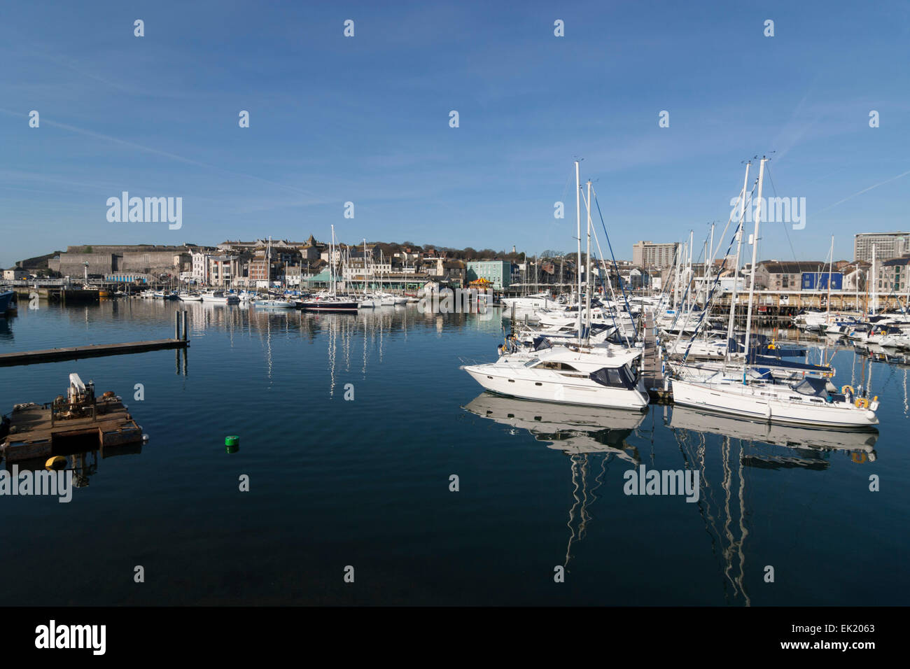Yachts and motor vessels moored at the Sutton Harbour marina, Plymouth, UK Stock Photo