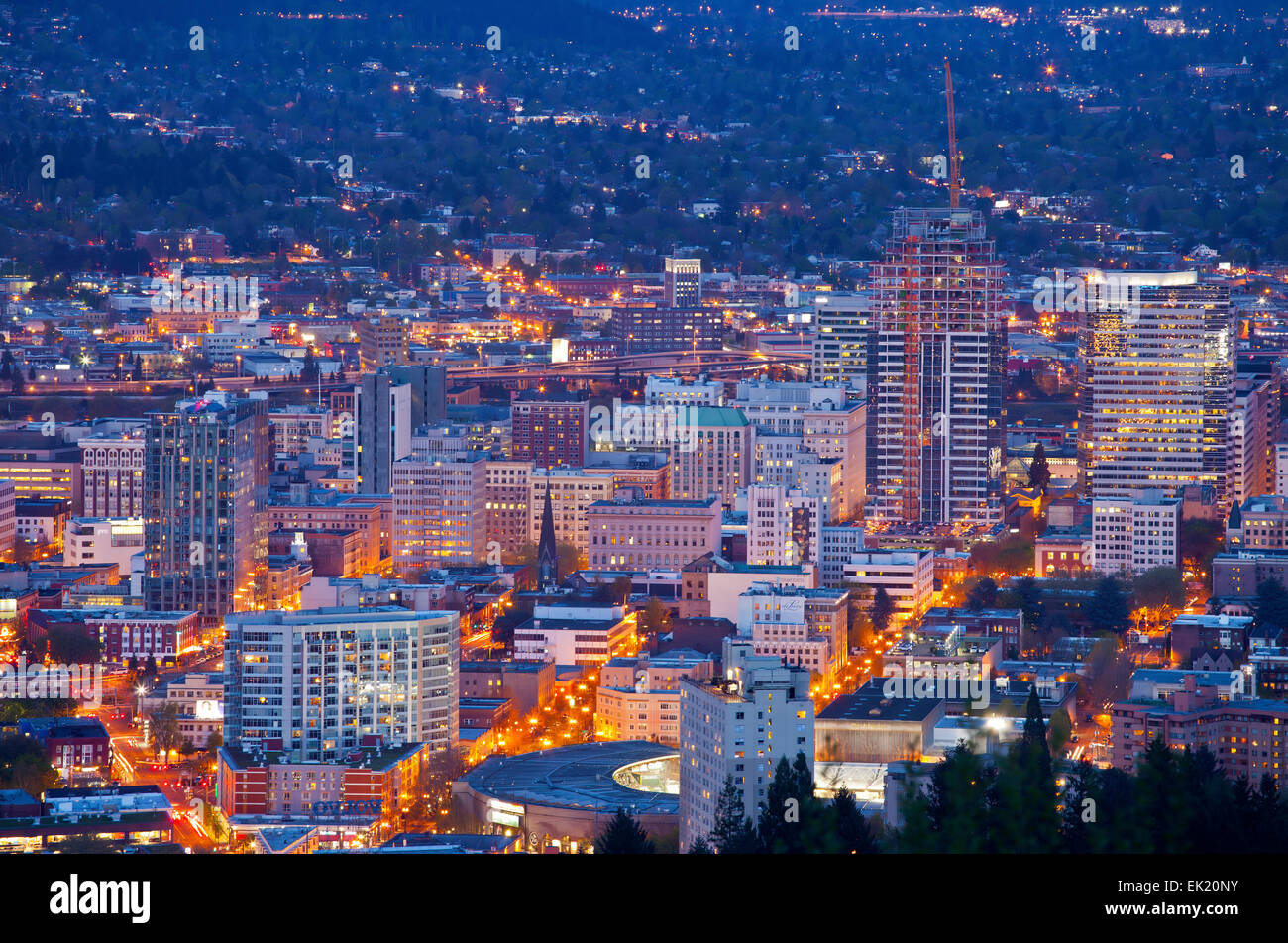 Downtown Portland Oregon city lights blue hour. Stock Photo