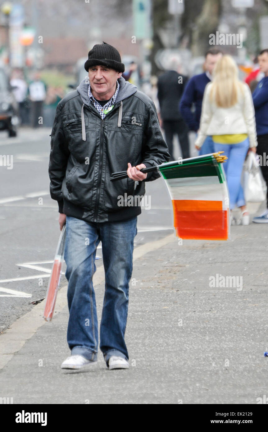 Belfast, Northern Ireland, UK. 5th April, 2015. A man sells Irish tricolour flags Credit:  Stephen Barnes/Alamy Live News Stock Photo