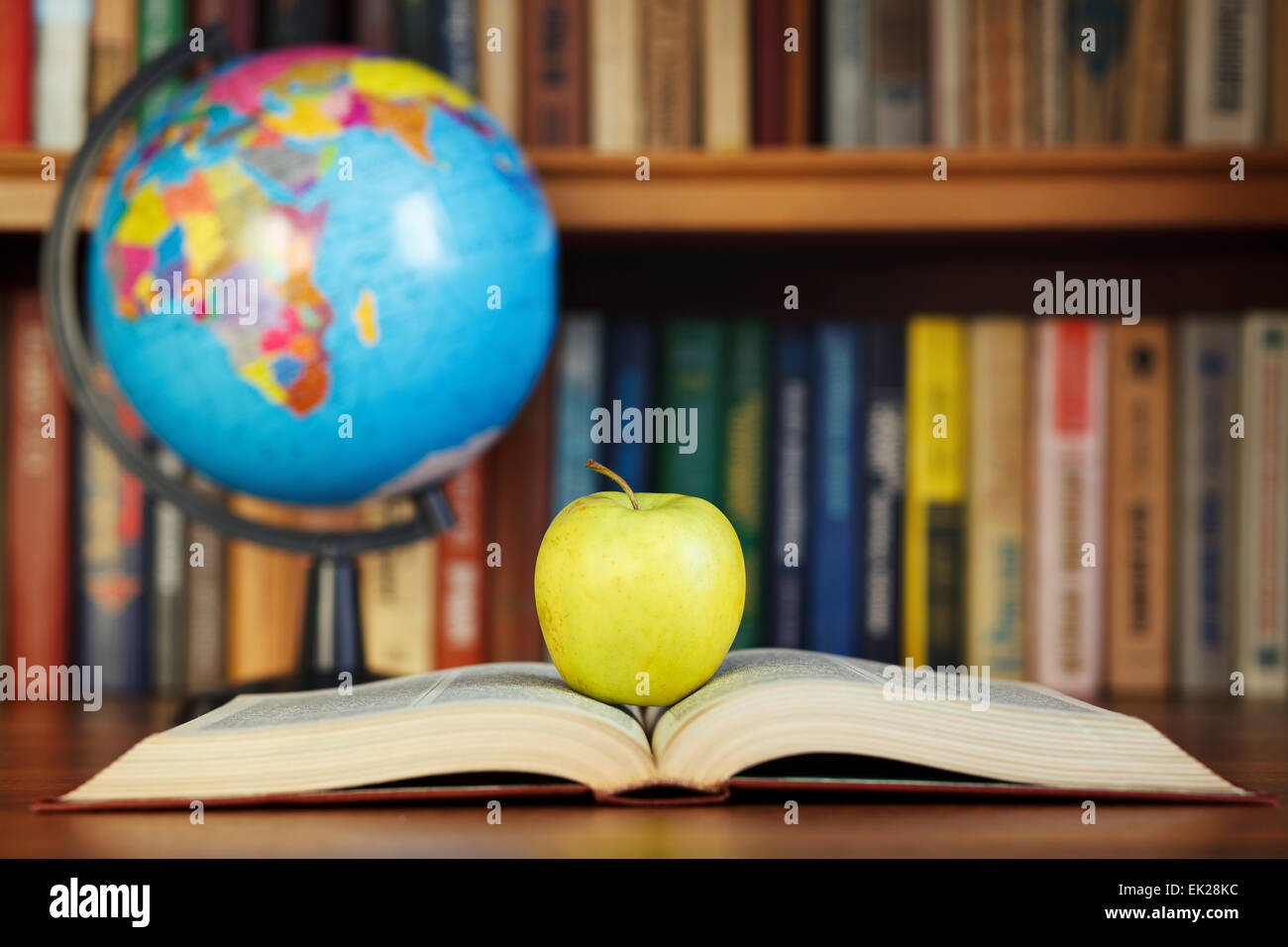 apple on the book Stock Photo
