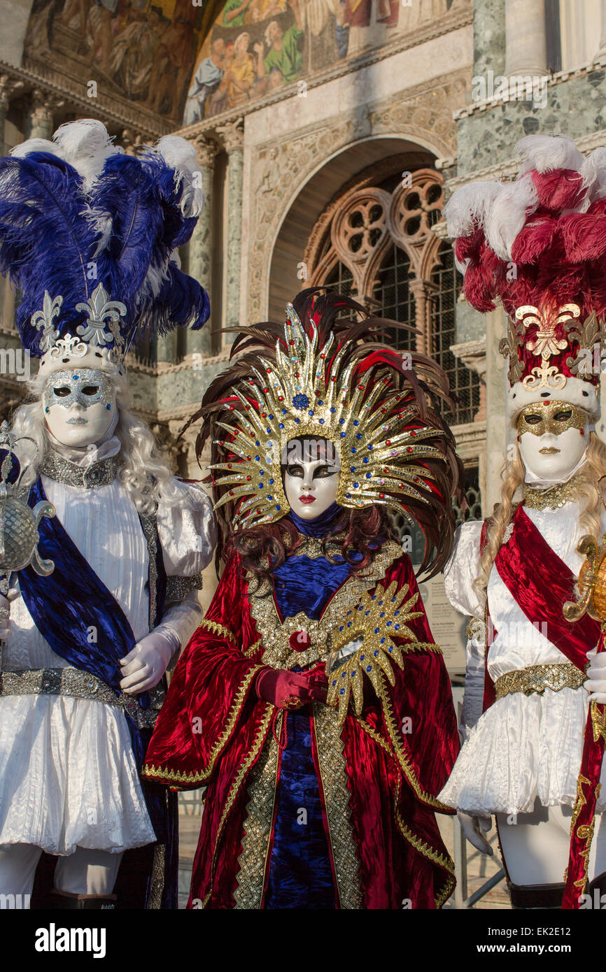 Three People in Carnival Mask and Costume, Venice, Italy Stock Photo