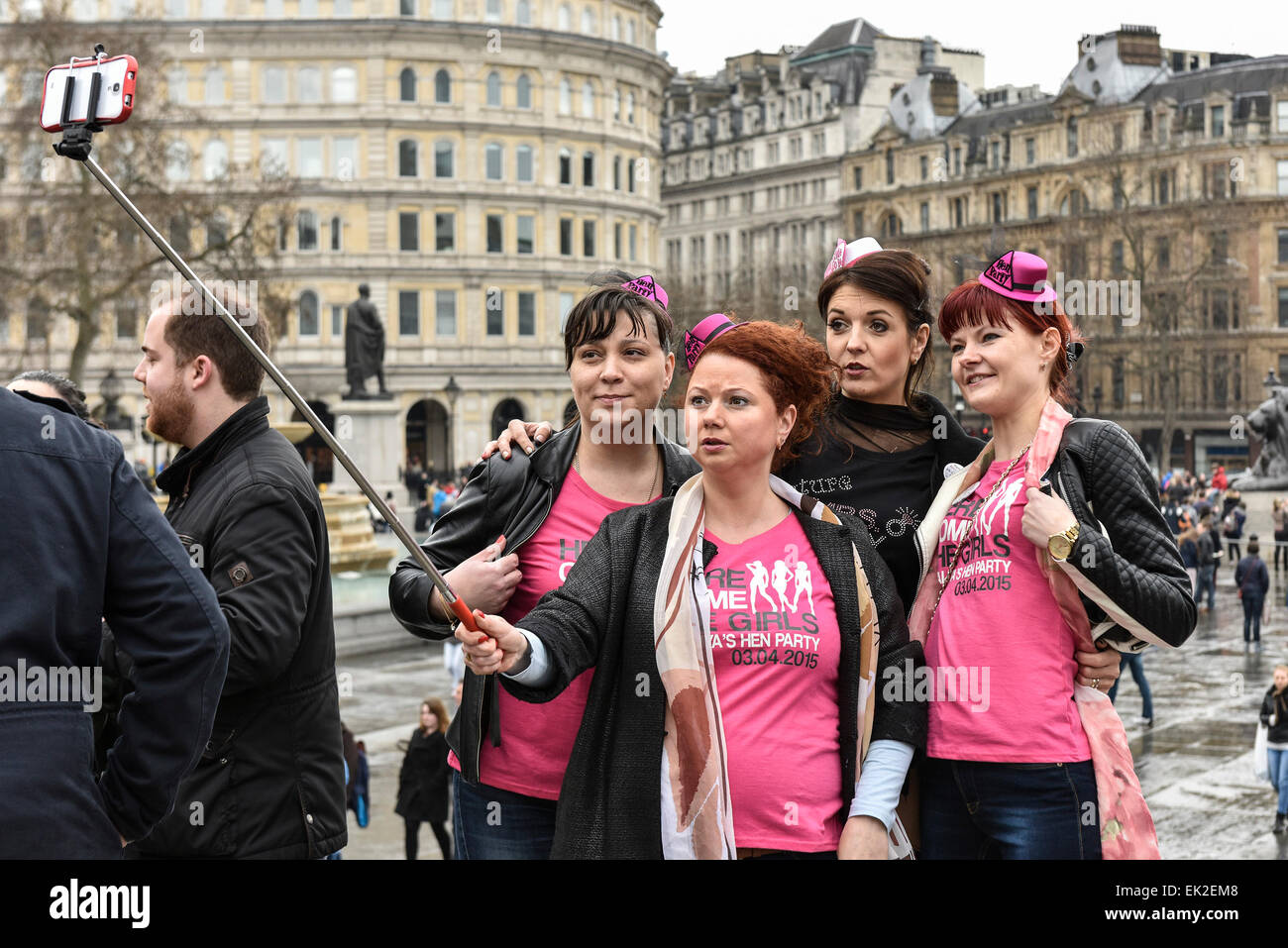 Women from a hen party taking a selfie in Trafalgar Square in London. Stock Photo