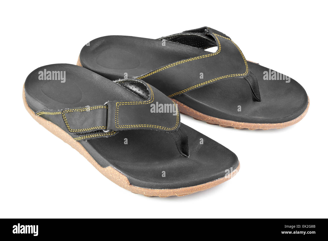 pair of black flip flops isolated on white background Stock Photo - Alamy