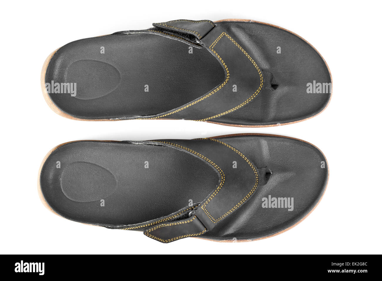 pair of black flip flops isolated on white background Stock Photo - Alamy