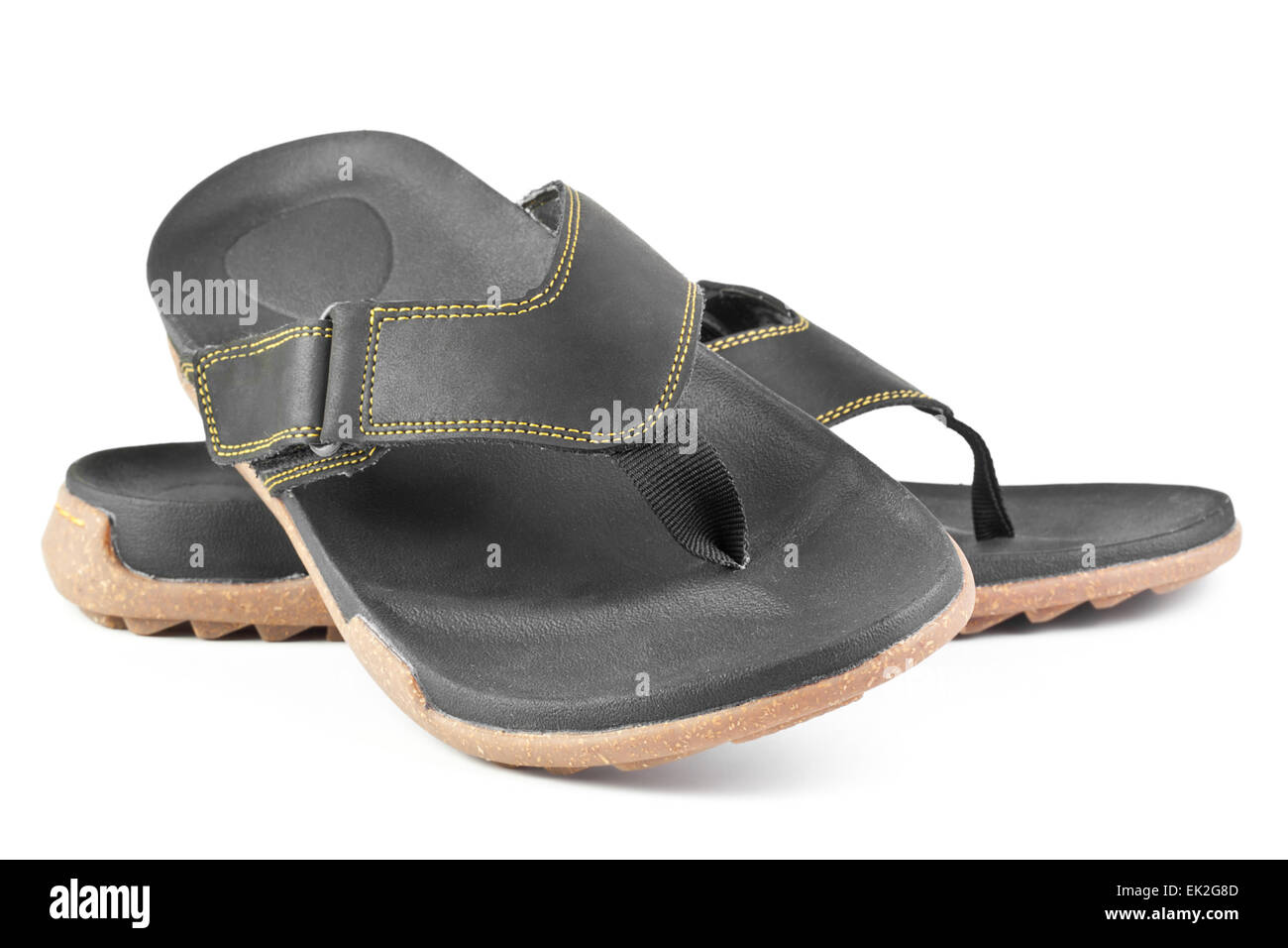 pair of black flip flops isolated on white background Stock Photo - Alamy